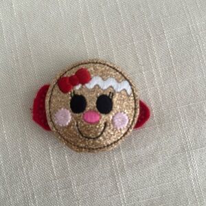 Gingerbread feltie hair clip
Handmade